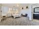 Bedroom featuring carpet, and an attached bathroom at 22475 E Hidden Trail Dr, Parker, CO 80138