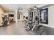 Spacious workout room featuring fitness equipment, rubber flooring, and large mirrors at 22475 E Hidden Trail Dr, Parker, CO 80138