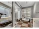 Basement home gym featuring a treadmill, rowing machine and storage at 2618 Bellavista St, Castle Rock, CO 80109