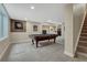 Finished basement with a pool table, carpet, and easy access to the stairs at 2618 Bellavista St, Castle Rock, CO 80109