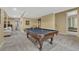 Basement rec room with a pool table and carpet, perfect for entertaining guests at 2618 Bellavista St, Castle Rock, CO 80109