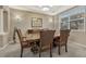 Traditional dining room with a wooden table, leather chairs, and elegant decor at 2618 Bellavista St, Castle Rock, CO 80109