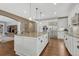 Open kitchen featuring stainless steel appliances, granite countertops, and hardwood flooring at 2618 Bellavista St, Castle Rock, CO 80109