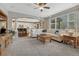 Spacious living room with large windows and an open floor plan to the kitchen at 2618 Bellavista St, Castle Rock, CO 80109