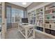 Bright home office with custom built-ins, a large window, and a comfortable workspace at 2618 Bellavista St, Castle Rock, CO 80109