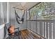 Relaxing outdoor patio area with a hammock chair, perfect for enjoying the fresh air at 6680 E Mississippi Ave # 3, Denver, CO 80224