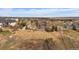 Expansive home with lush yard, mature trees, and scenic mountain views in established neighborhood at 7635 Weaver Cir, Castle Rock, CO 80104