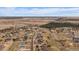 Stunning aerial view showcasing the beautiful community with mountain views in the background at 7635 Weaver Cir, Castle Rock, CO 80104
