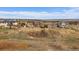 Aerial view showing a sprawling home and expansive backyard, plus neighborhood at 7635 Weaver Cir, Castle Rock, CO 80104