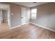Cozy bedroom features a window for natural light and neutral wall color at 1568 Verbena St, Denver, CO 80220