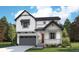 Charming two-story home featuring a modern farmhouse design with a welcoming front porch and attached two-car garage at 8273 Snake River St, Littleton, CO 80125