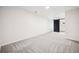 Finished basement room featuring neutral carpet and an attached bathroom at 3196 S Logan St, Englewood, CO 80113