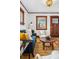 Inviting living room features stylish decor, wood floors, and natural light from multiple windows at 3196 S Logan St, Englewood, CO 80113