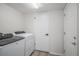 Laundry room with a washer and dryer and access to a doorway at 7852 S Logan St, Littleton, CO 80122