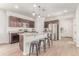Spacious kitchen with stainless steel appliances, a large island, and ample counter space at 9862 Reunion Pkwy, Commerce City, CO 80022
