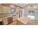 Modern kitchen featuring stainless steel appliances, white cabinetry, and center island at 10538 Tiger Chase, Lone Tree, CO 80124