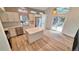 Modern kitchen featuring stainless steel appliances, white cabinetry, and center island at 10538 Tiger Chase, Lone Tree, CO 80124