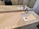 Close up view of a sink with marble countertop and chrome faucet at 10538 Tiger, Lone Tree, CO 80124