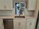 Close-up of a kitchen sink with stainless steel appliances and granite countertops at 10538 Tiger, Lone Tree, CO 80124