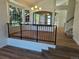 Bright living room boasts hardwood floors, natural light, and an open floor plan, creating an inviting atmosphere at 10538 Tiger, Lone Tree, CO 80124