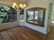 Bright living room boasts hardwood floors, natural light, and an open floor plan, creating an inviting atmosphere at 10538 Tiger, Lone Tree, CO 80124