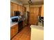 Functional kitchen with stainless steel appliances and ample cabinet storage at 14201 E 1St Dr # 104, Aurora, CO 80011