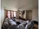 Comfortable living room with plush sofas, a ceiling fan, and a modern entertainment setup at 14201 E 1St Dr # 104, Aurora, CO 80011