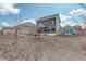 Expansive backyard with garden, a shed, and plenty of room for recreation at 4971 Ceylon Way, Denver, CO 80249