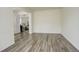 Bright and airy living space with modern flooring and neutral paint, creating a welcoming atmosphere at 4971 Ceylon Way, Denver, CO 80249