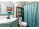 Bathroom features modern fixtures, a stylish vanity, and a shower with curtain at 8730 Chase Dr # 141, Arvada, CO 80003