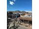 Welcome to G. An outdoor view of the town and mountains taken from a high-rise building at 1203 Washington Ave # 201, Golden, CO 80401