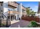 Private backyard with deck and modern townhome at 63 Harrison St, Denver, CO 80206