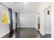 Bright bedroom with dark hardwood floors and view of trees at 63 Harrison St, Denver, CO 80206