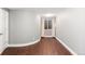 Basement bedroom with hardwood floors and window at 63 Harrison St, Denver, CO 80206