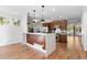 Eat-in kitchen with island and stainless steel appliances at 63 Harrison St, Denver, CO 80206