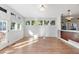 Spacious living room with hardwood floors and large windows at 63 Harrison St, Denver, CO 80206