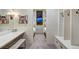 Narrow bunkroom features built-in bunk beds, white shiplap walls, vanity, and ample storage at 422 Timber Trail Rd, Breckenridge, CO 80424