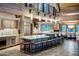 Gourmet kitchen with counter seating and views to the living room at 422 Timber Trail Rd, Breckenridge, CO 80424