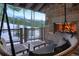 Cozy outdoor seating area with fireplace and stunning mountain views at 422 Timber Trail Rd, Breckenridge, CO 80424