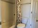 Simple tiled bathroom with a shower-tub combo and traditional fixtures and accessories at 1339 Sumner St # B, Longmont, CO 80501