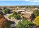 Beautiful aerial shot of a luxurious estate home featuring a circular driveway and fountain at 4719 Beverly Ln, Erie, CO 80516