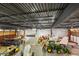 Spacious hangar featuring ample equipment and space for airplanes, tractors, and other machinery at 4719 Beverly Ln, Erie, CO 80516