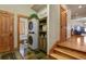 Practical mudroom features washer/dryer, utility sink and stairs to the main house at 4719 Beverly Ln, Erie, CO 80516