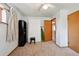 Bedroom featuring neutral carpet, ceiling fan, and natural light from the window at 6050 Marshall Ct, Arvada, CO 80003
