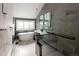 Luxurious bathroom with a freestanding tub, glass-enclosed shower, and elegant finishes offers a spa-like experience at 521 N Fairfax St, Denver, CO 80220