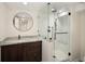 Elegant bathroom with frameless shower, modern vanity, and designer fixtures at 521 N Fairfax St, Denver, CO 80220