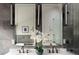 Elegant bathroom with marble countertops, dual sinks, and decorative lighting offers a sophisticated design at 521 N Fairfax St, Denver, CO 80220