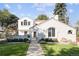 Beautiful home with a well-kept front yard, inviting walkway, and classic architectural details at 521 N Fairfax St, Denver, CO 80220