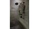 Modern shower features sleek fixtures, a rainfall showerhead, and tiled walls for a spa-like experience at 521 N Fairfax St, Denver, CO 80220