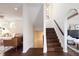 View of a two-story staircase showing the main floor and basement-level living room at 521 N Fairfax St, Denver, CO 80220